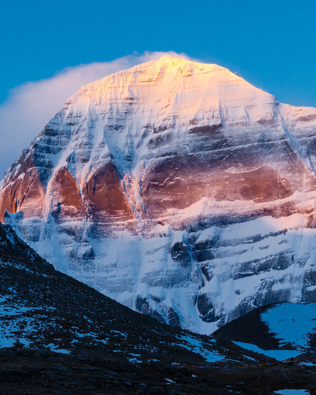 Snow-covered Mount Kailash rising above the Tibetan plateau